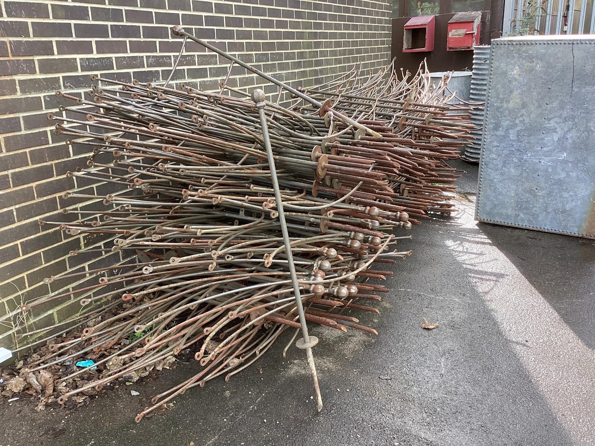 Approximately 350 metres of bespoke wrought iron garden pathway fencing/railing with simple post and pin installation, above ground height 96cm.